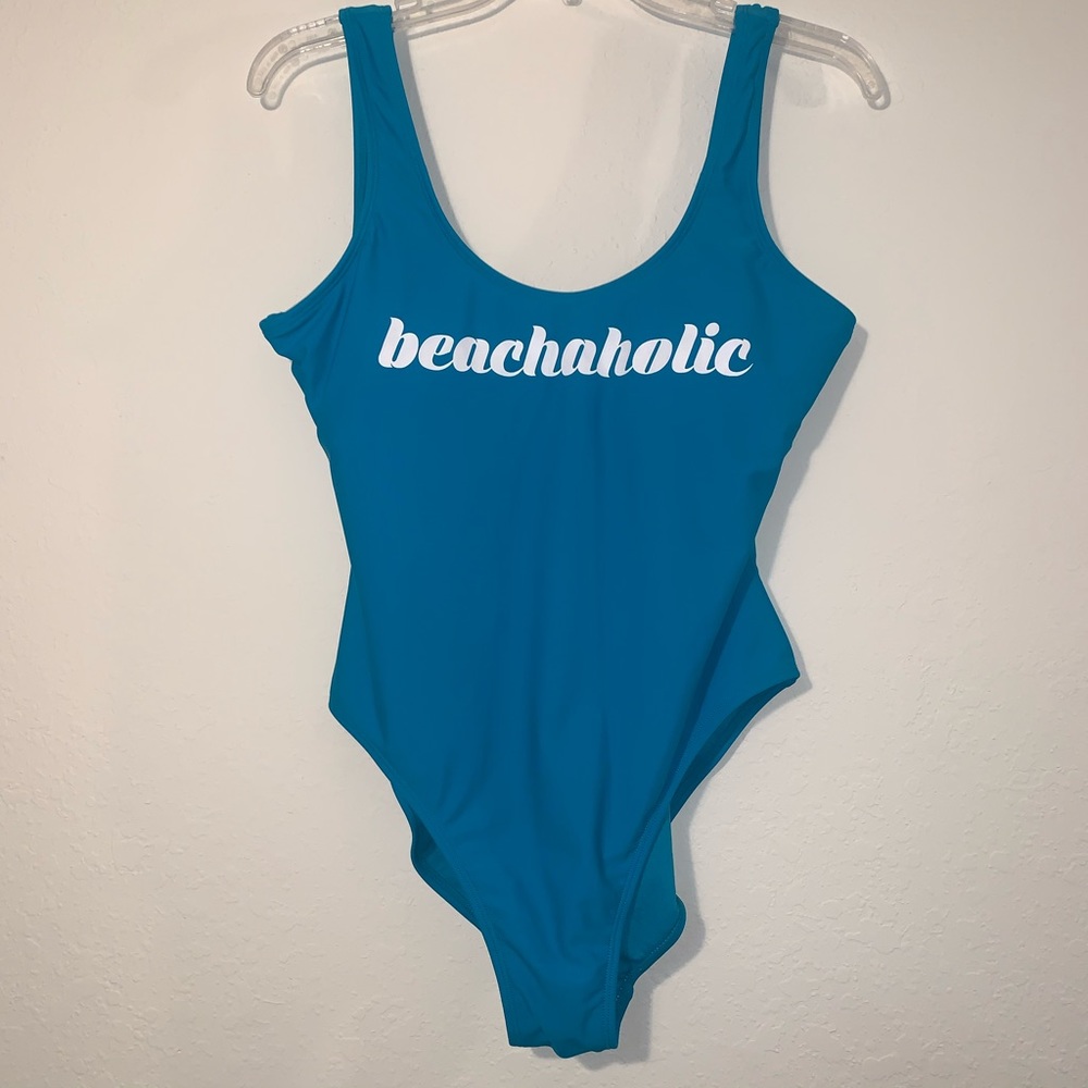 “beachaholic” one piece swimsuit. Good condition!